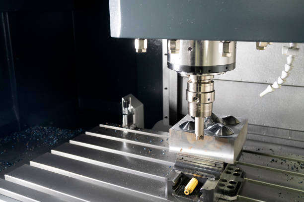 The CNC milling machine rough cutting the mould parts with the indexable radius endmill tools. The mold and die manufacturing process by machining centre with the indexable tools.